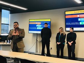 Dr. Ajay Aluri, Founding Director of the Hospitality Innovation and Technology (HIT) Lab and Associate Professor in the Hospitality and Tourism Management program, speaks during presentations from his students